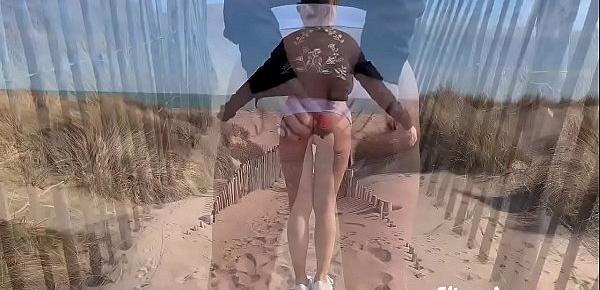  Flashing wearing no panties by going to the beach